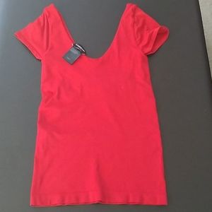 Bebe red V-neck top size XS/S (P)